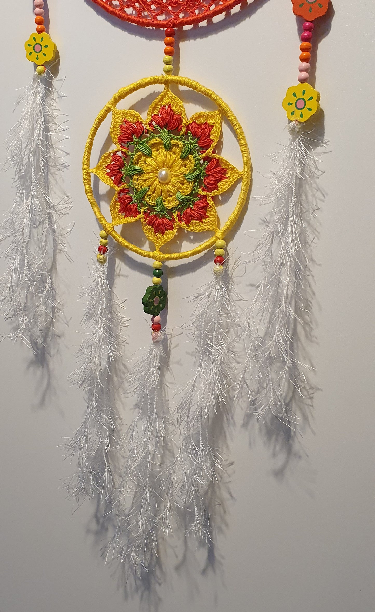 happy colorful dreamcatcher with feathers