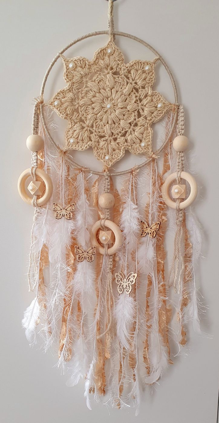 - White and beige feather wall decor