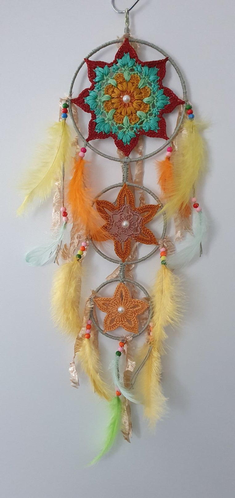 Colorful dreamcatcher with feathers