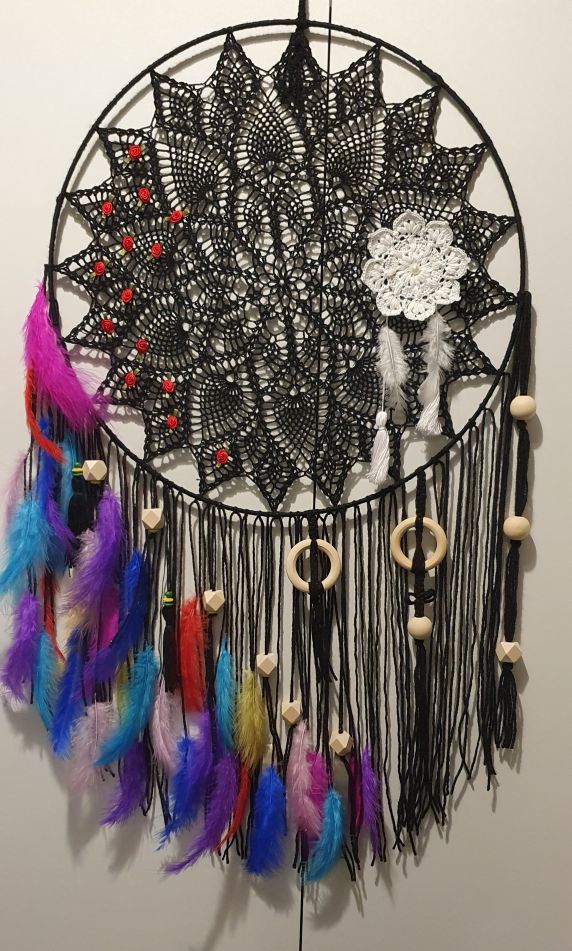 Black lace dreamcatcher with colorful feathers