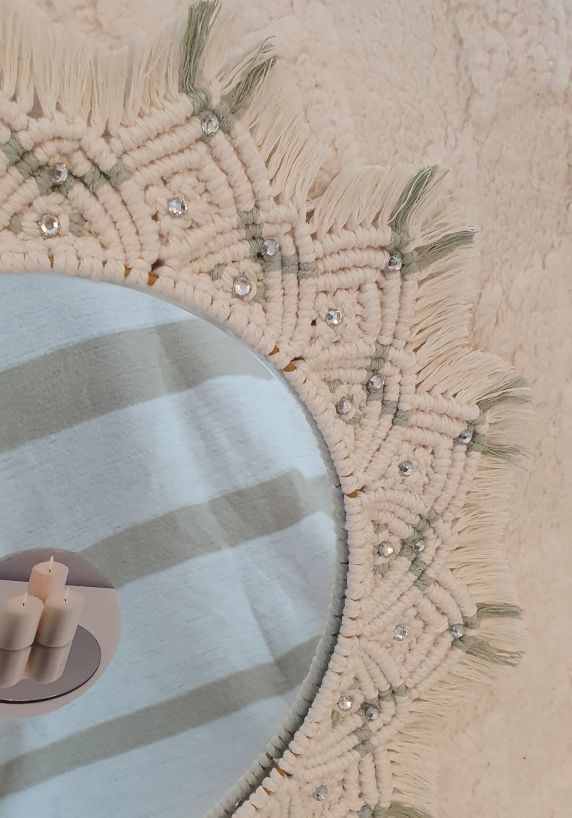 Decorative round mirror with beaded frame