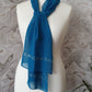 blue scarf decorated with pearls