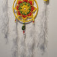 happy colorful dreamcatcher with feathers 
