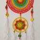 Colorful crocheted dreamcatcher with beads and feathers 