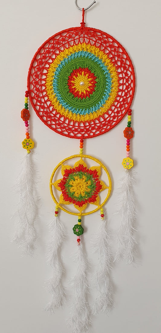 Colorful crocheted dreamcatcher with beads and feathers 