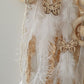 Decorative dreamcatcher with feathers and wooden ring