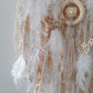 Airy soft colors on a pastel dream catcher