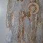 pastel dreamcatcher decorated with wooden ring an bead