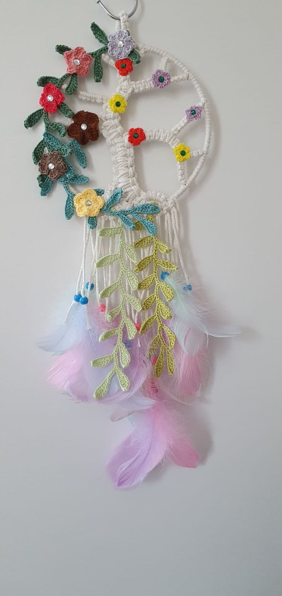 colorful macrame dreamcatcher with crochet flowers