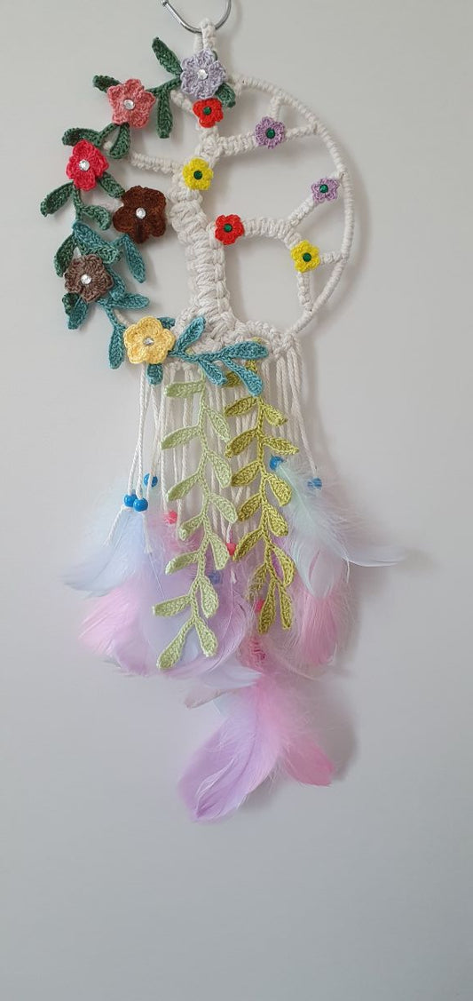 colorful macrame dreamcatcher with crochet flowers