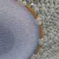 Rund mirror between 2 metal rings
