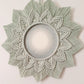 round mirror in the macrame frame