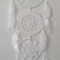 White dreamcatcher with feathers 