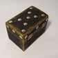 black small wooden box inside gold