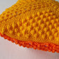 small crochet yellow cushion