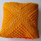 yellow crochet cushion