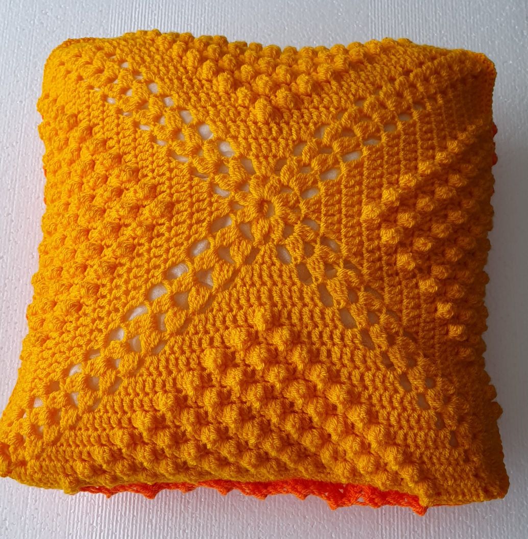 yellow crochet cushion