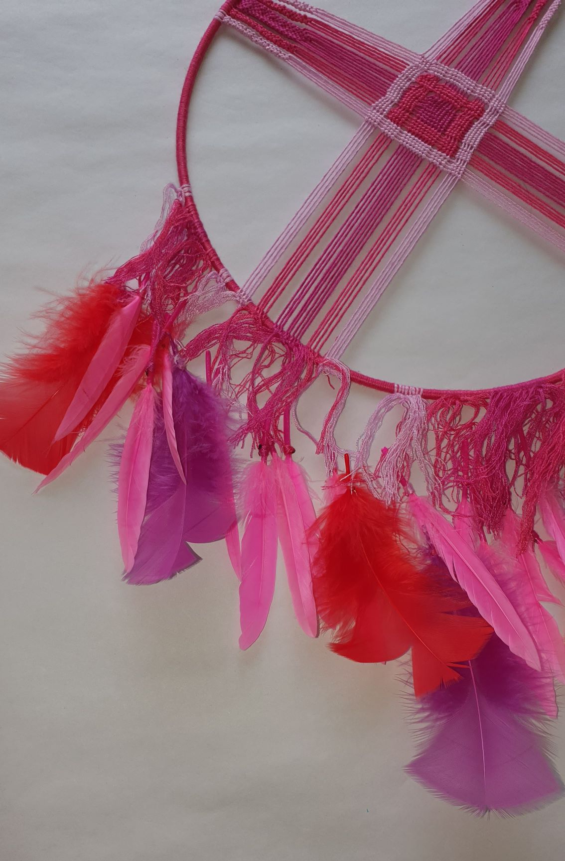 pink dreamcatcher with pink feather
