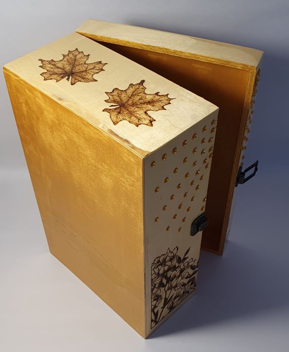 inside gold pyrography wooden box