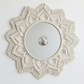 Cream round mirror in macrame frame