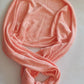 orange knitted circle scarf