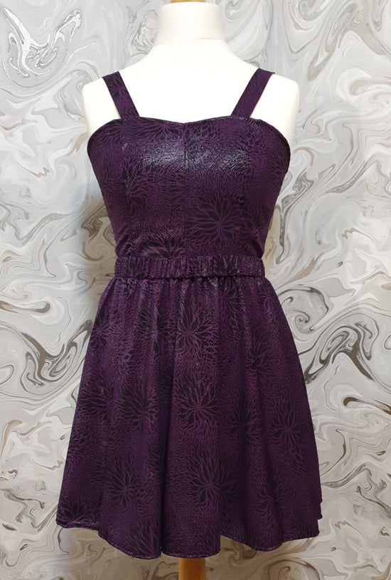 purple corset and skirt