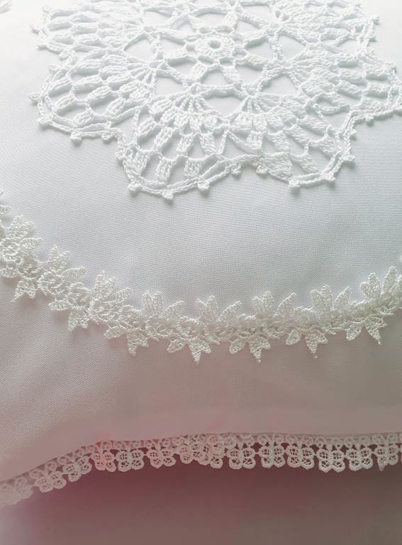 cute white cushion with hand made crochet lace