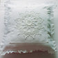 white small cushion with crochet star lace