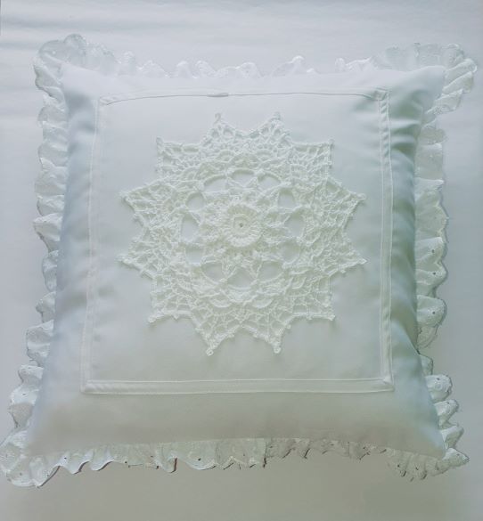 white small cushion with star crochet lace